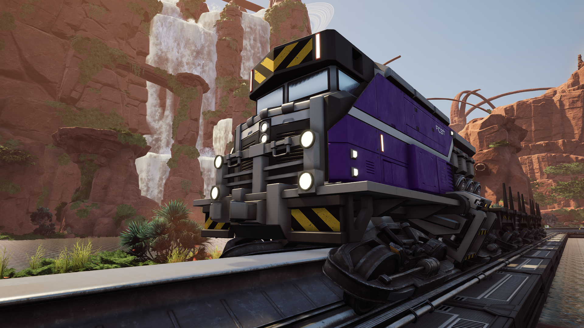 A train in Satisfactory with no cargo, driving alongside a waterfall